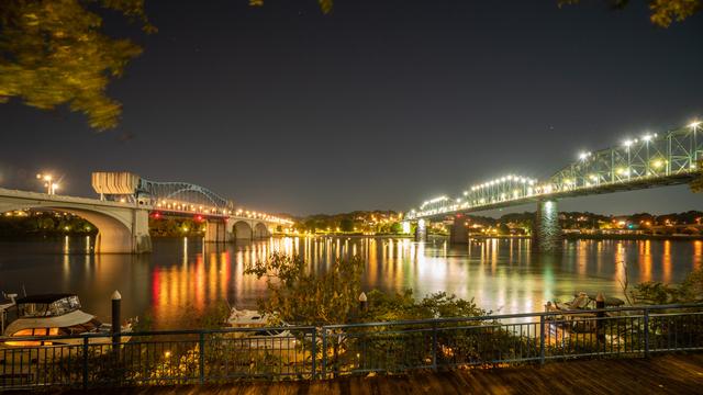 Chattanooga bridges and city lights reflected in the Tennessee River at night
